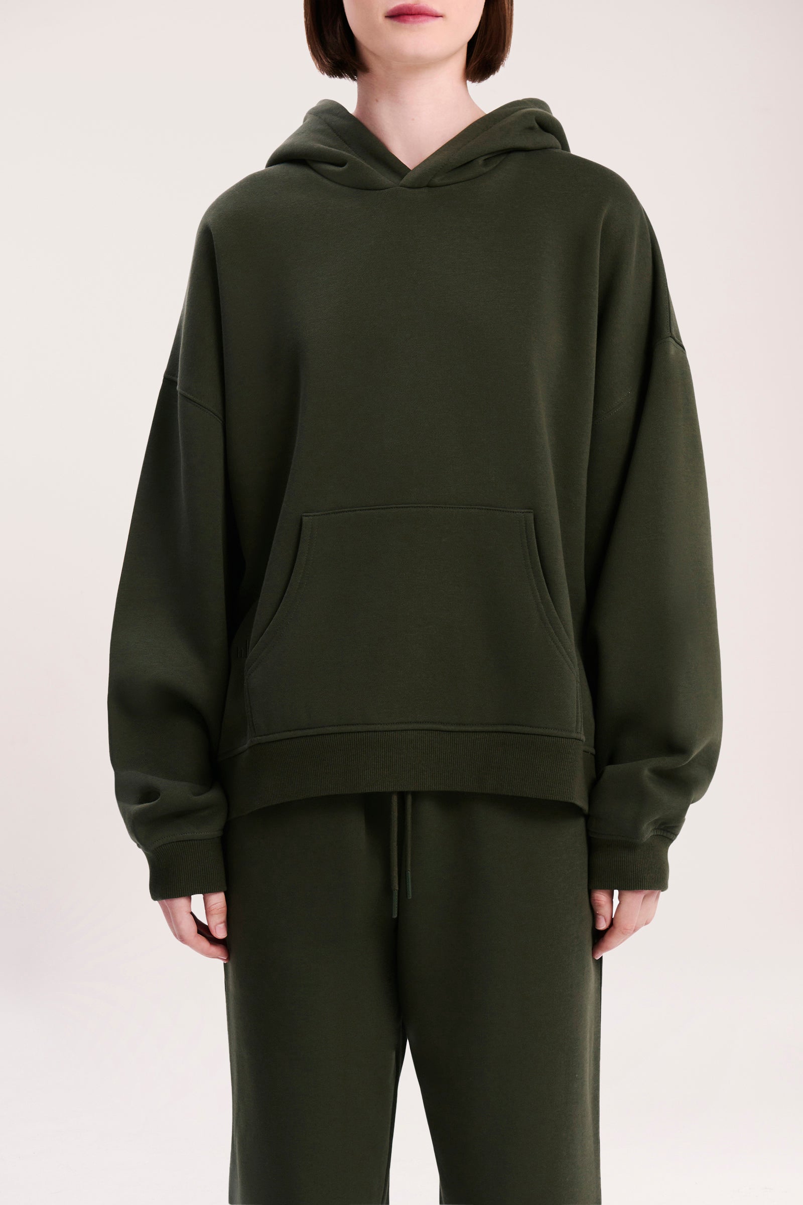 Nude Lucy Carter Curated Hoodie In A Deep Green Hunter Colour 