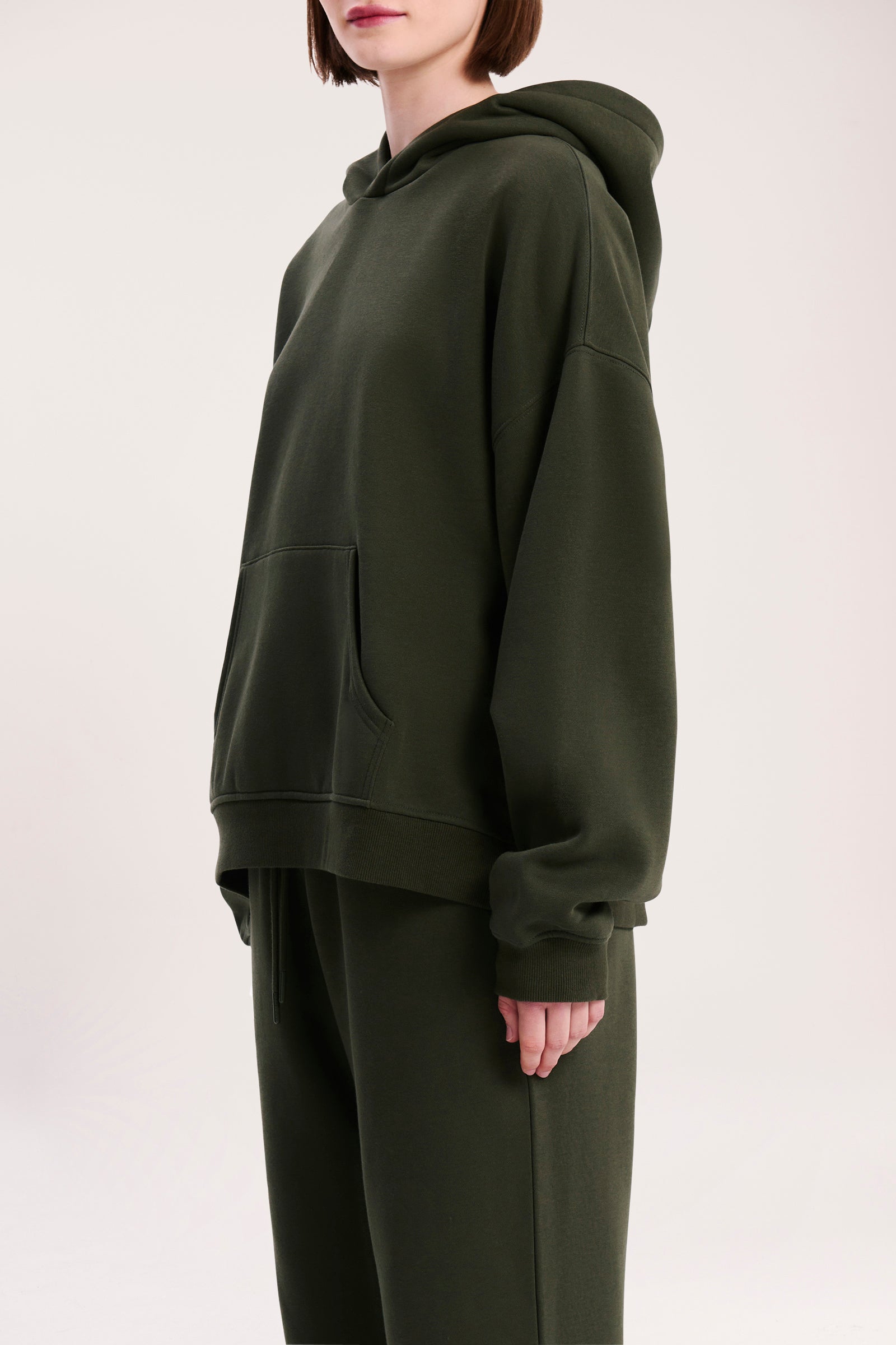 Nude Lucy Carter Curated Hoodie In A Deep Green Hunter Colour 