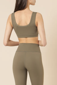 Nude Lucy nude active crop top olive top