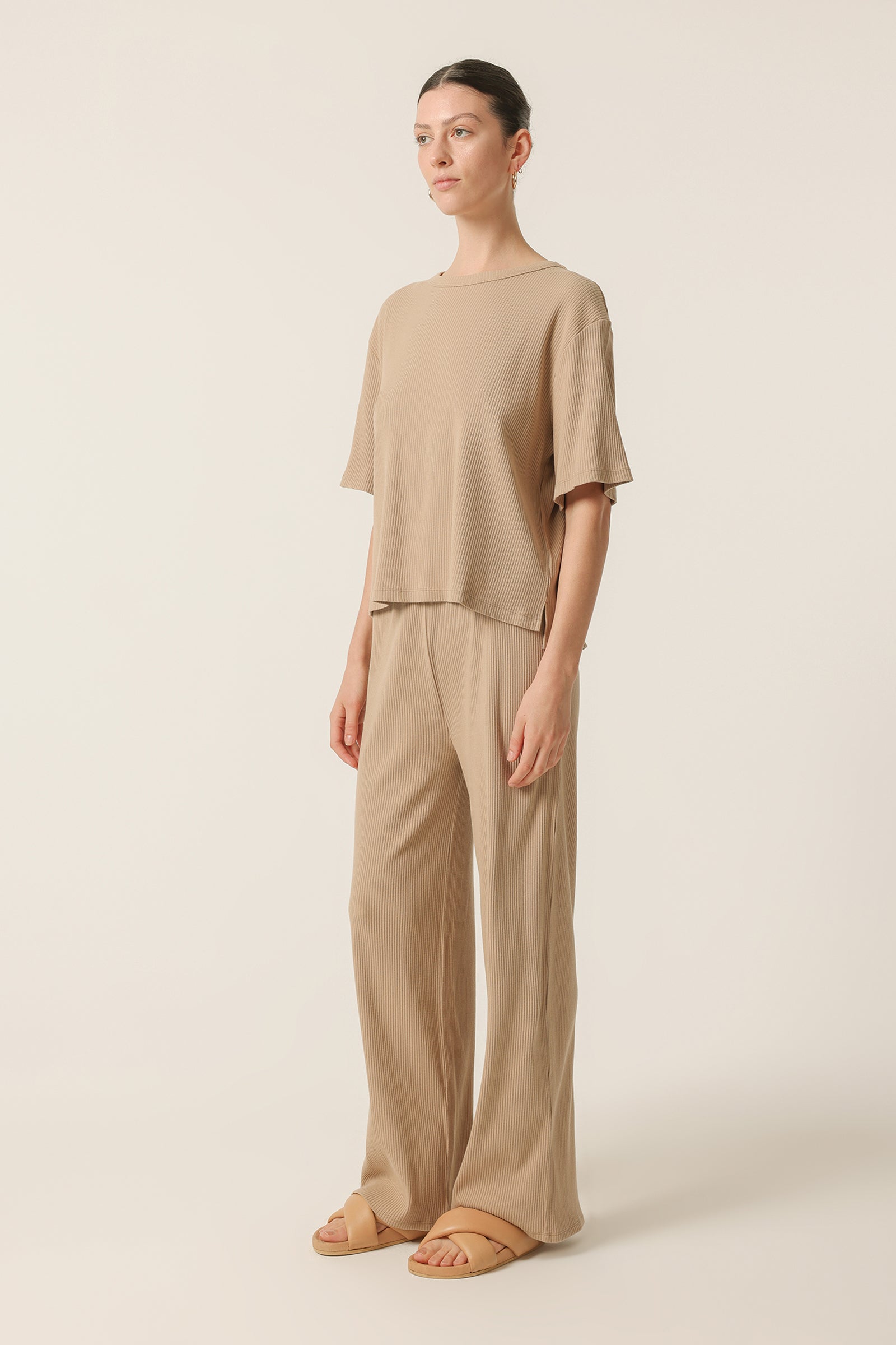Nude Lucy Nude Lounge Ribbed Pant In A Beige Sepia Colour 