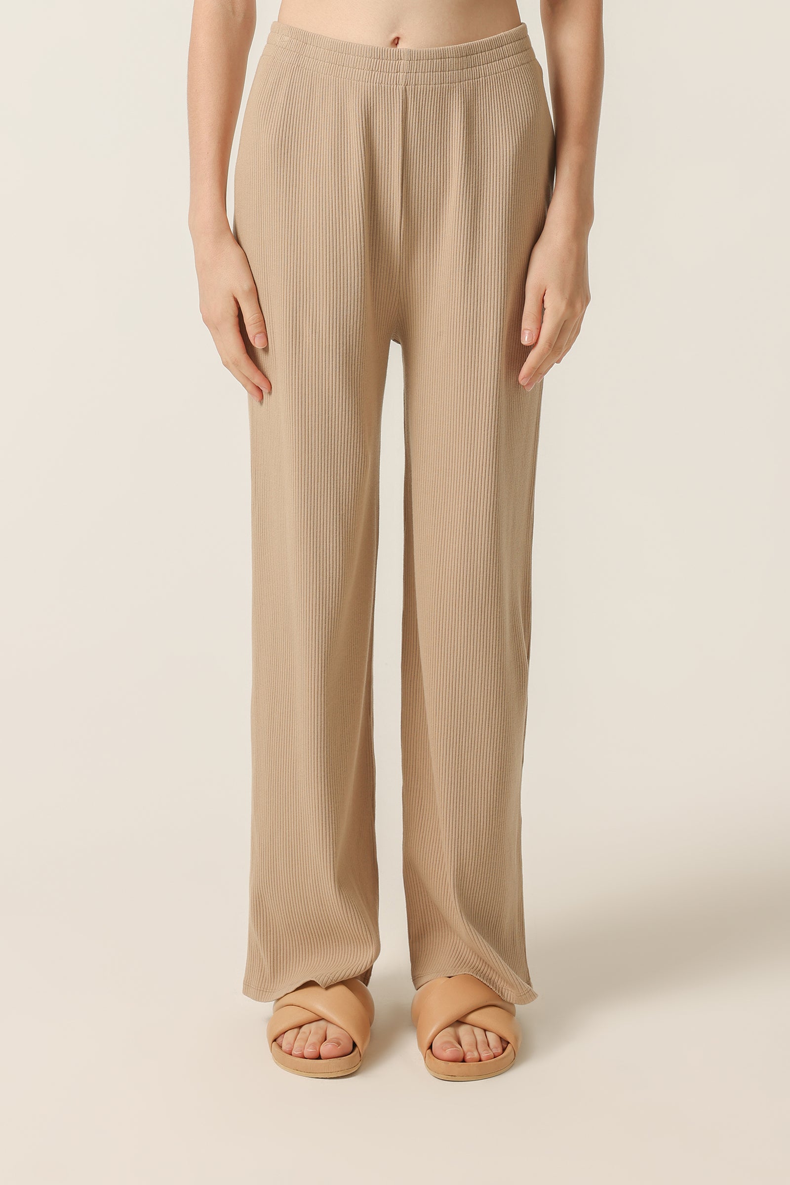 Nude Lucy Nude Lounge Ribbed Pant In A Beige Sepia Colour 