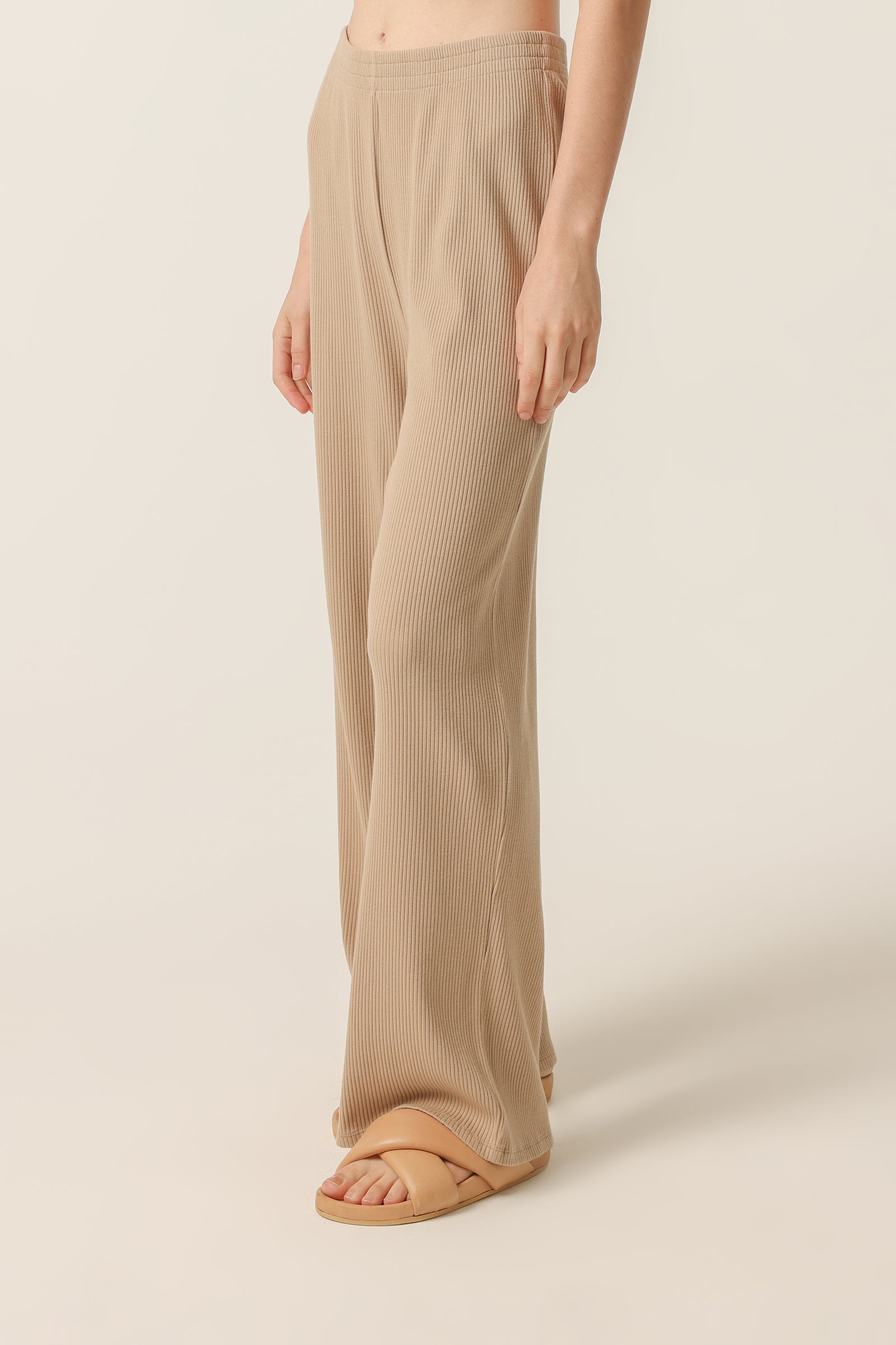 Nude Lucy Nude Lounge Ribbed Pant In A Beige Sepia Colour 