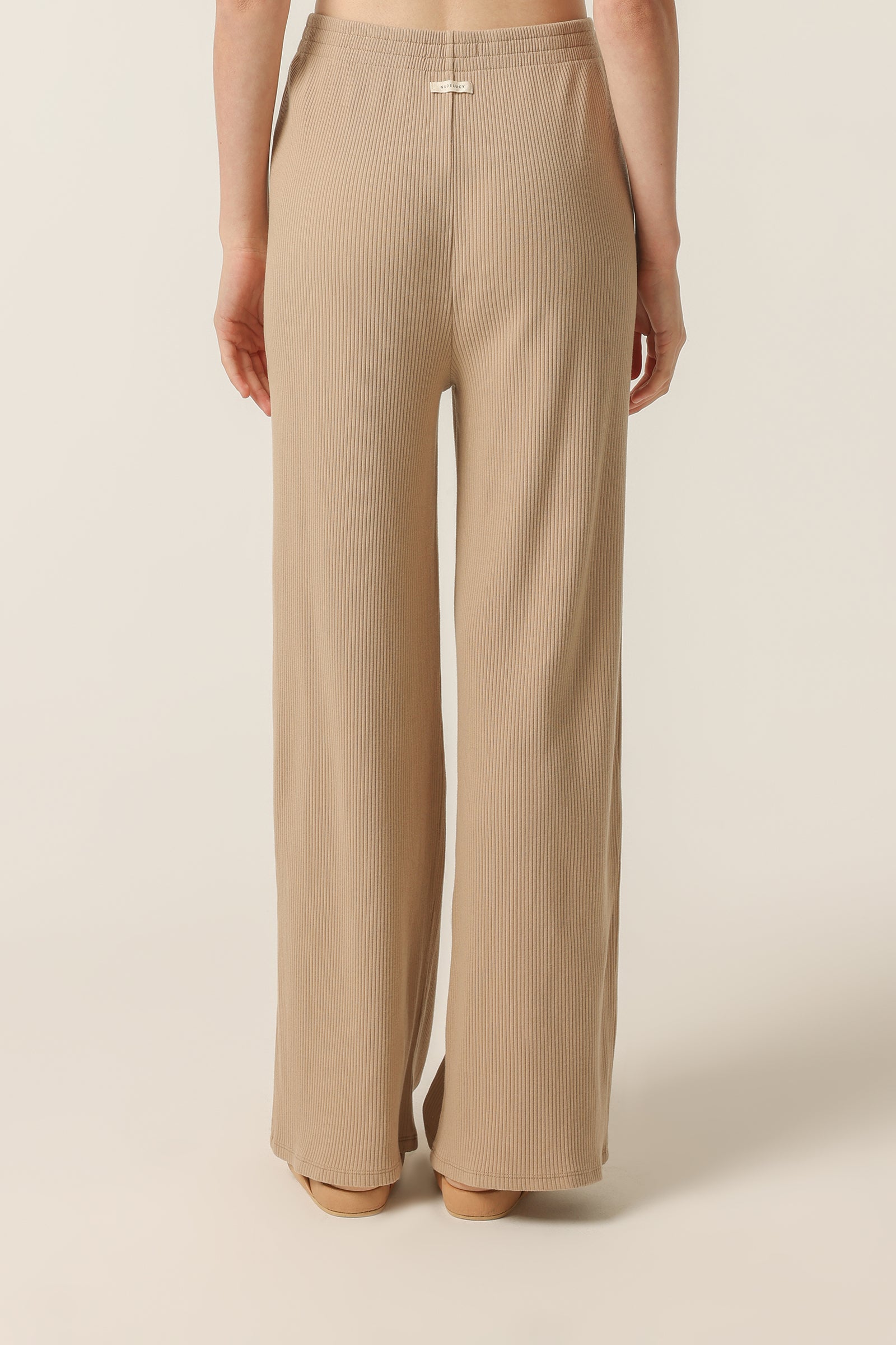 Nude Lucy Nude Lounge Ribbed Pant In A Beige Sepia Colour 