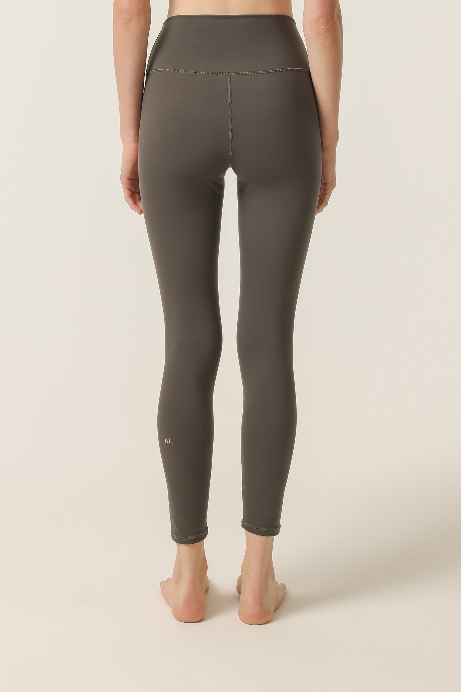 Nude Lucy Nude Active Tights In A Dark Grey In A Brown Coal Colour 