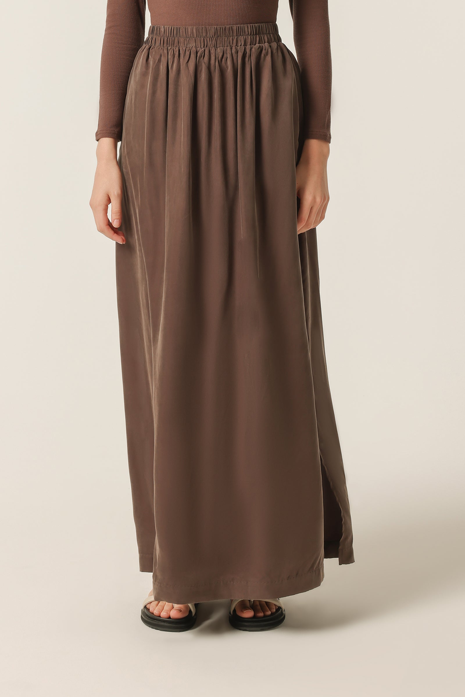 Nude Lucy Gia Cupro Maxi Skirt In A Deep Brown Bark Colour 