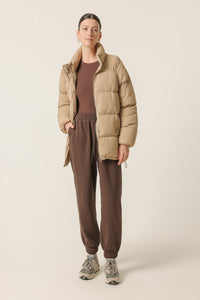 Nude Lucy Topher Longline Puffer In a Beige Sepia Colour