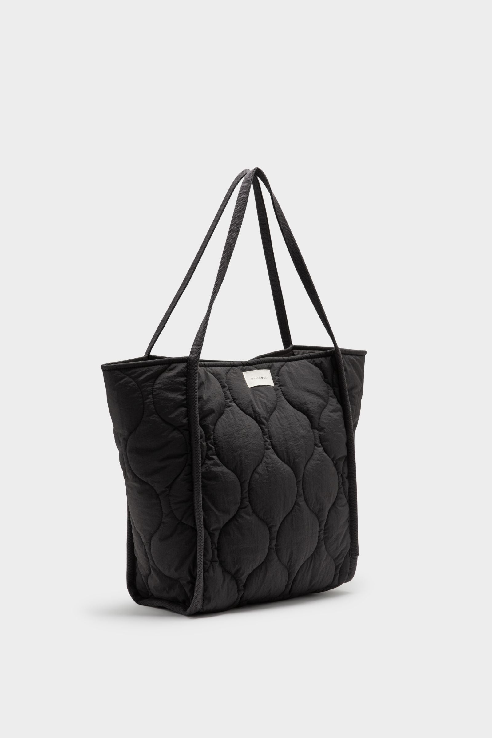 Nude Lucy Nude Puffer Tote In A Dark Grey In A Brown Coal Colour 
