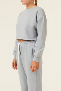 Nude Lucy Carter Classic Crop Sweat In a Green & Blue Toned Marine Colour