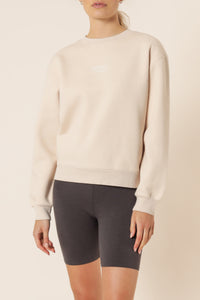Nude Lucy nude classics slogan sweat almond top