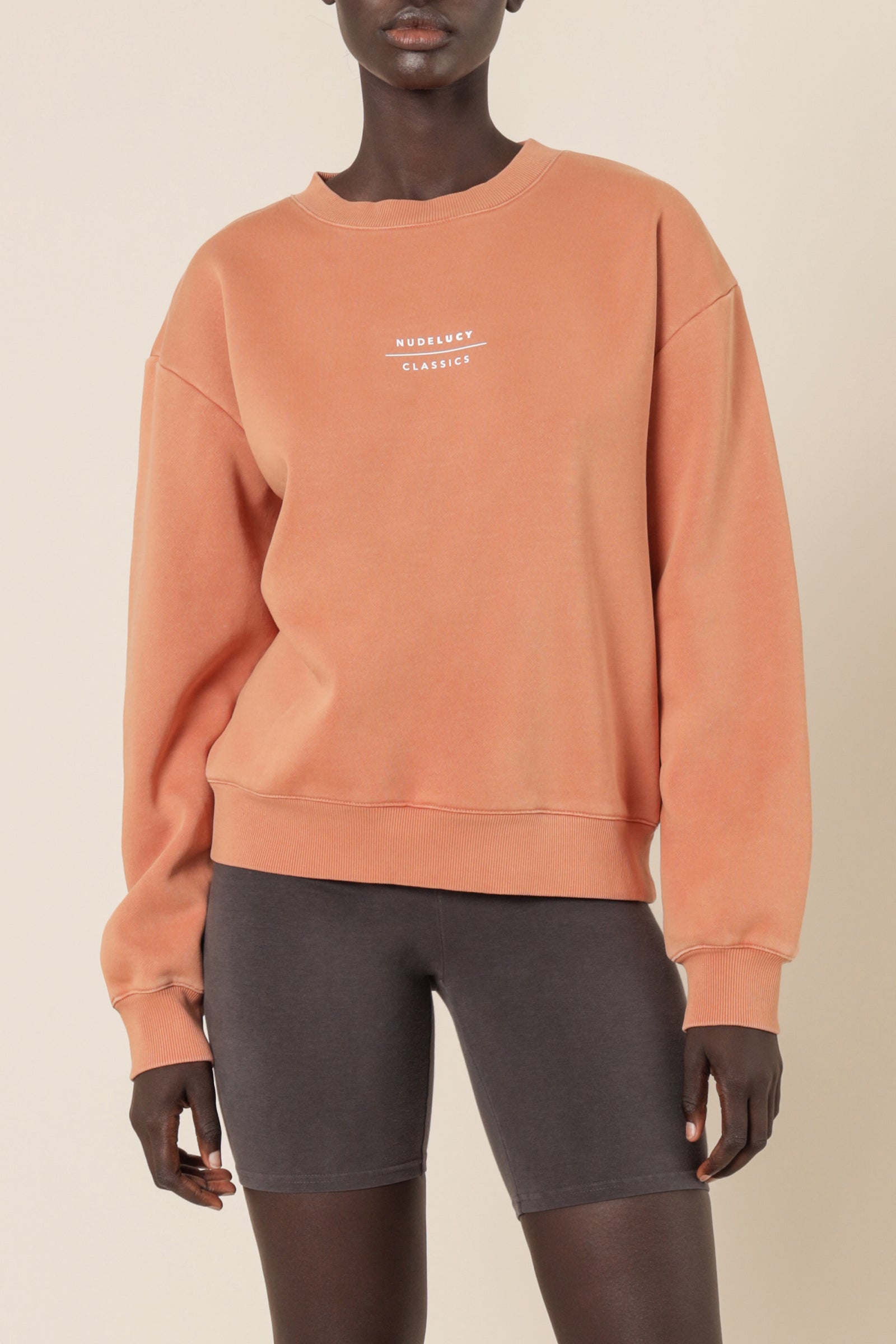 Nude Lucy nude classics slogan sweat terracotta top