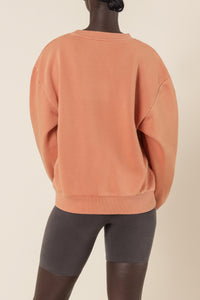 Nude Lucy nude classics slogan sweat terracotta top