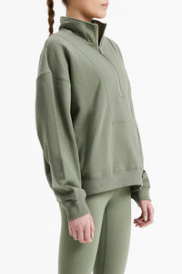 Nude Lucy Nude Active Quarter Zip Sweat In a Green Willow Colour