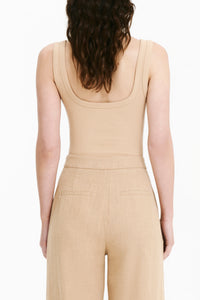 Nude Lucy Axel Bodysuit In A Light Yellow Toned Dune Colour