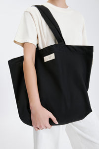 Nude Lucy Nude Travel Tote in a Dark Grey In a Brown Coal Colour