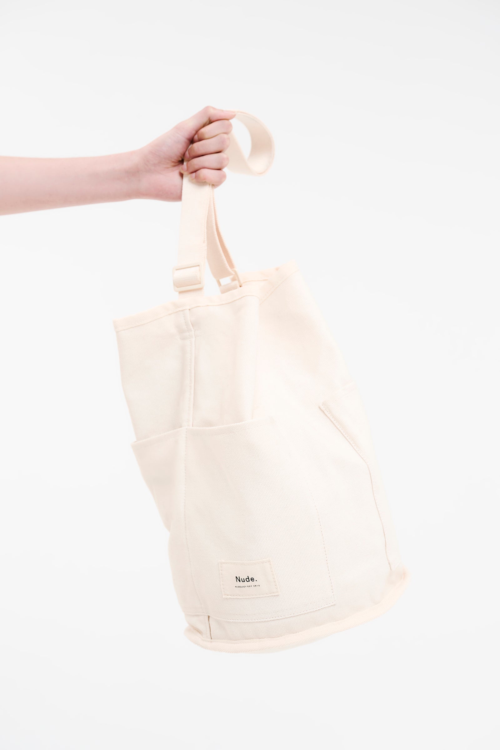 Nude Lucy Canvas Bucket Bag In White Cloud 