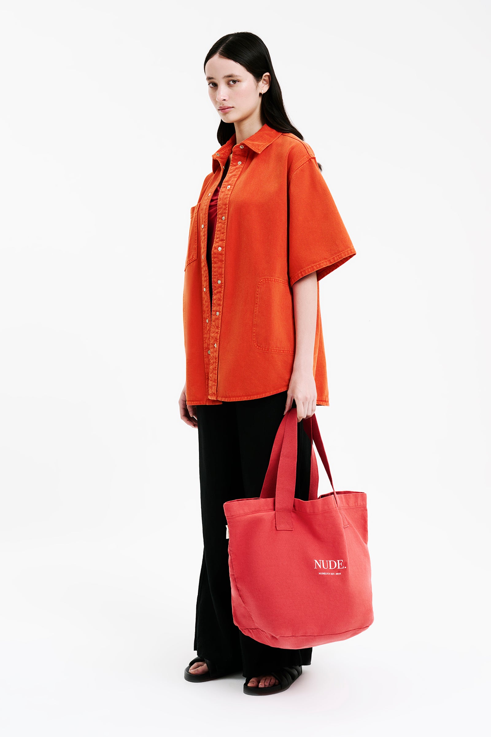 Nude Lucy Nude Tote Bag In A Pink & Orange Toned Coral Colour 