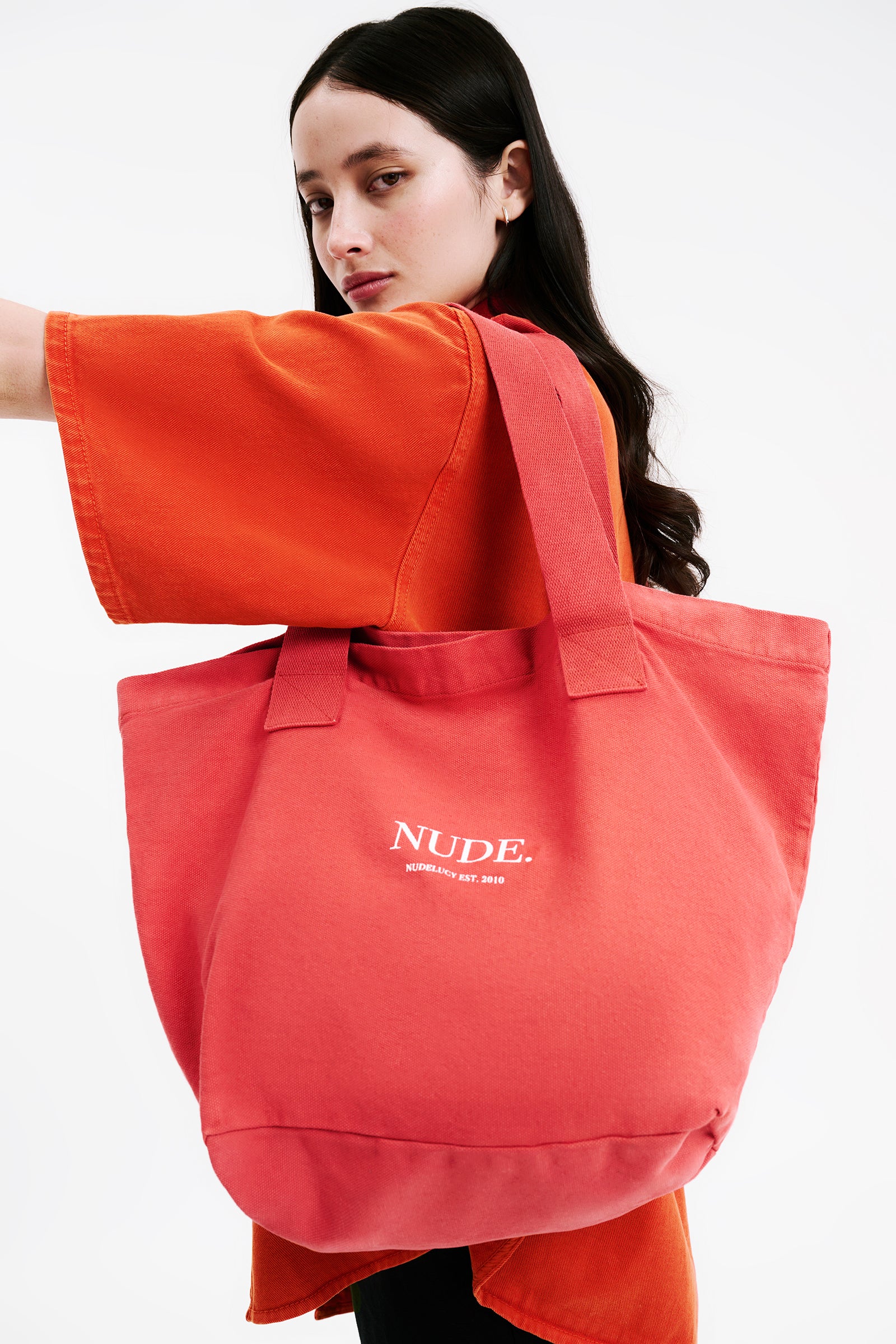 Nude Lucy Nude Tote Bag In A Pink & Orange Toned Coral Colour 