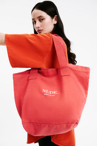 Nude Lucy Nude Tote Bag in a Pink & Orange Toned Coral Colour