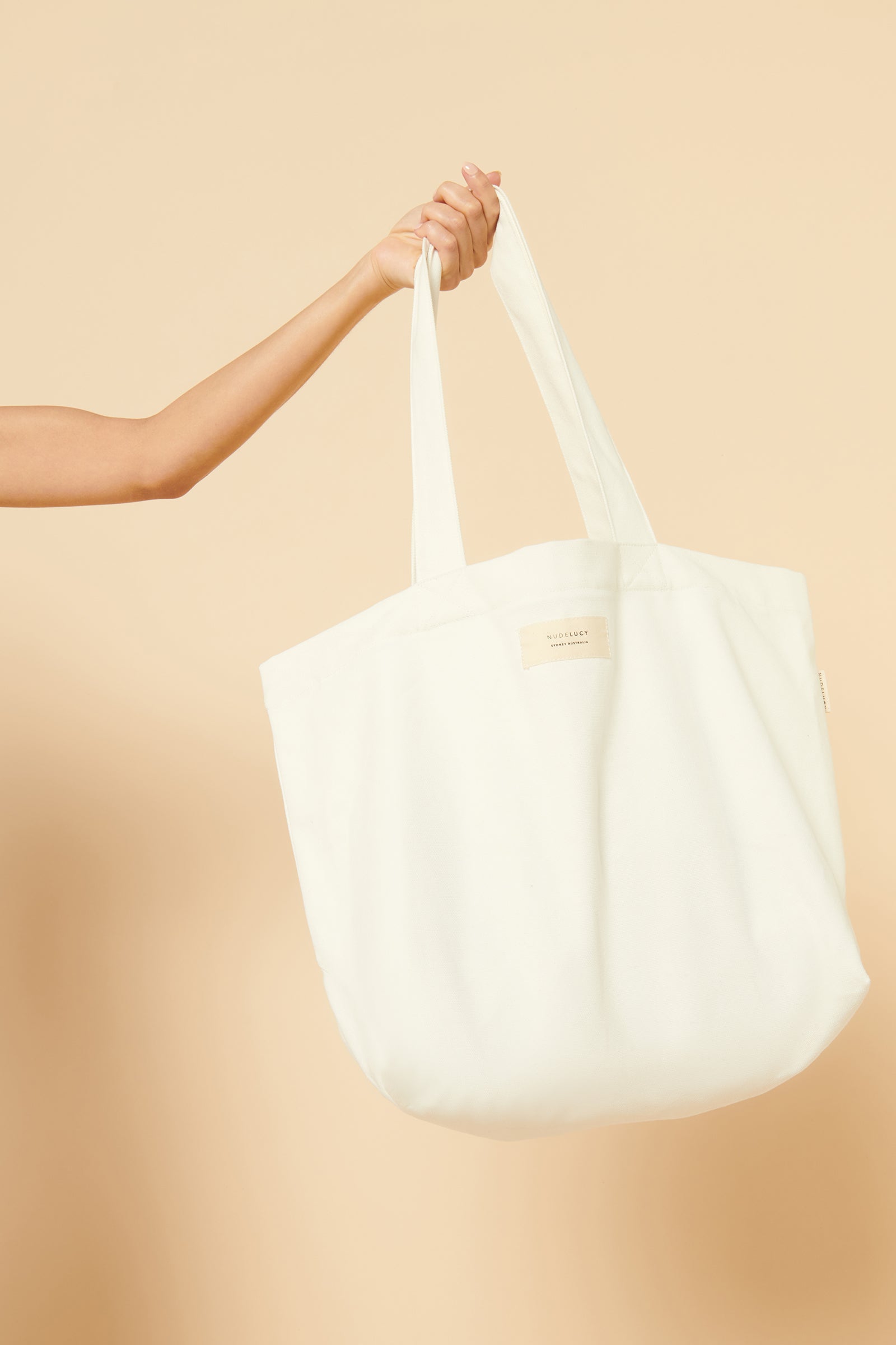 Nude Lucy Nude Travel Tote In White 